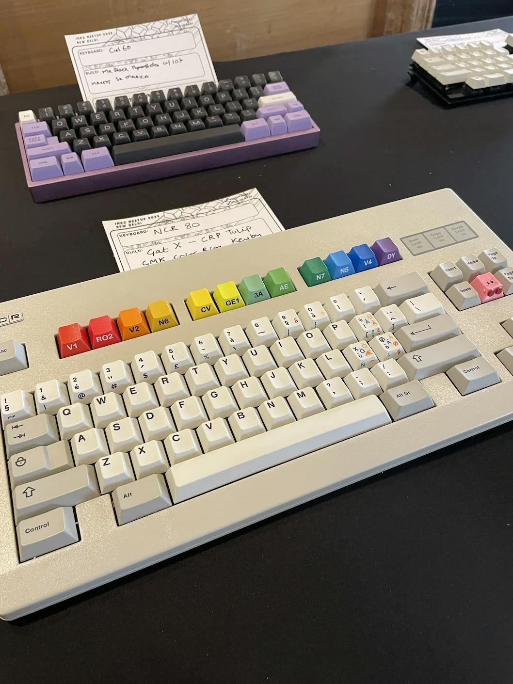 A vintage, TKL size mechanical keyboard with beige keycaps