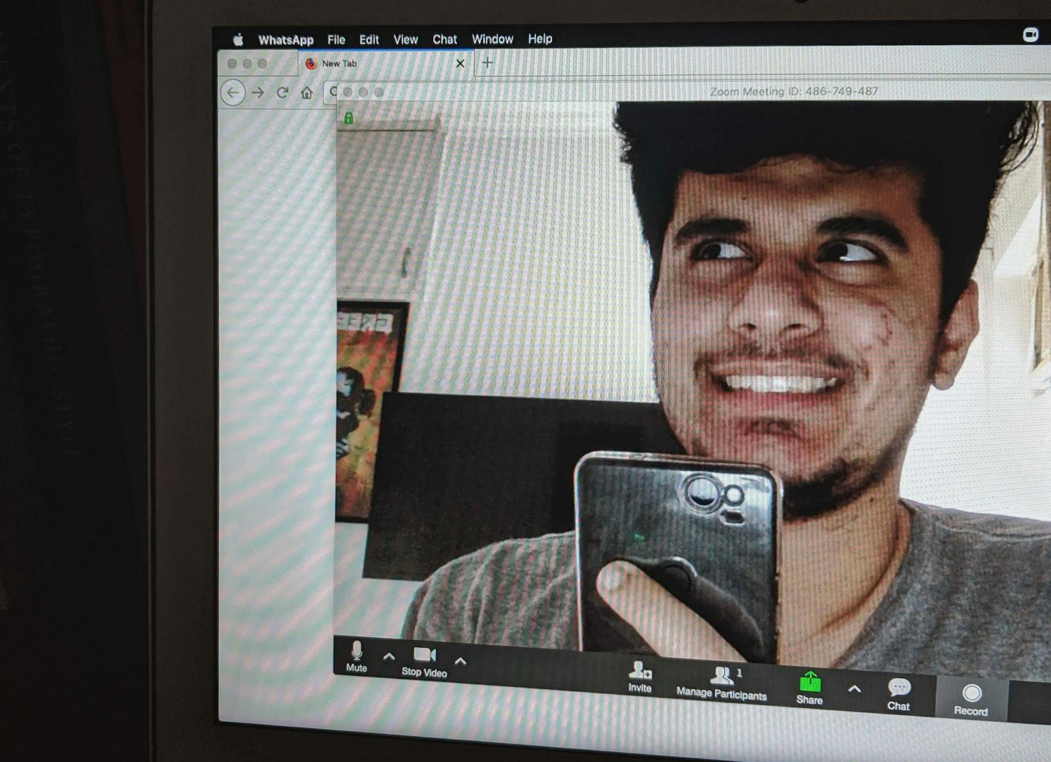 Selfie of Ratik smiling waiting for a Zoom call to begin